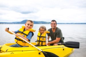 Oak Meadow Family in a yellow kayak