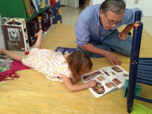 Father helping young student