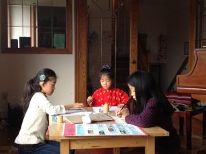 sisters studying together