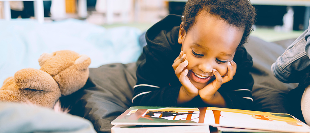 homeschool student reading picture book