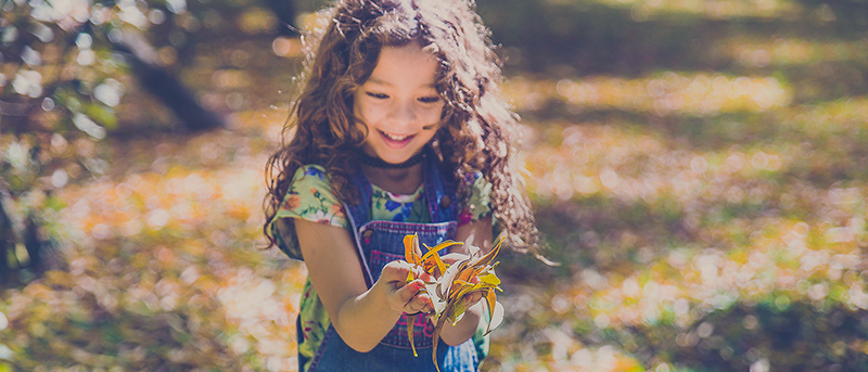 homeschool student on a fall scavenger hunt