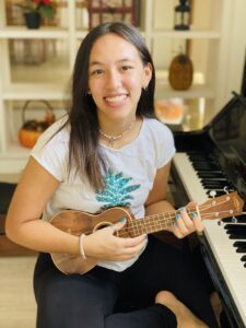 Virginia Scharkowski holding a ukulele