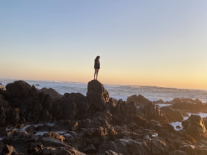 Sequoia Friedman on the California coast at sunset