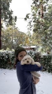 Sequoia Friedman holding a fluffy dog