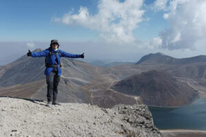 Joan Manuel Sarmiento on the summit of a mountainGomez