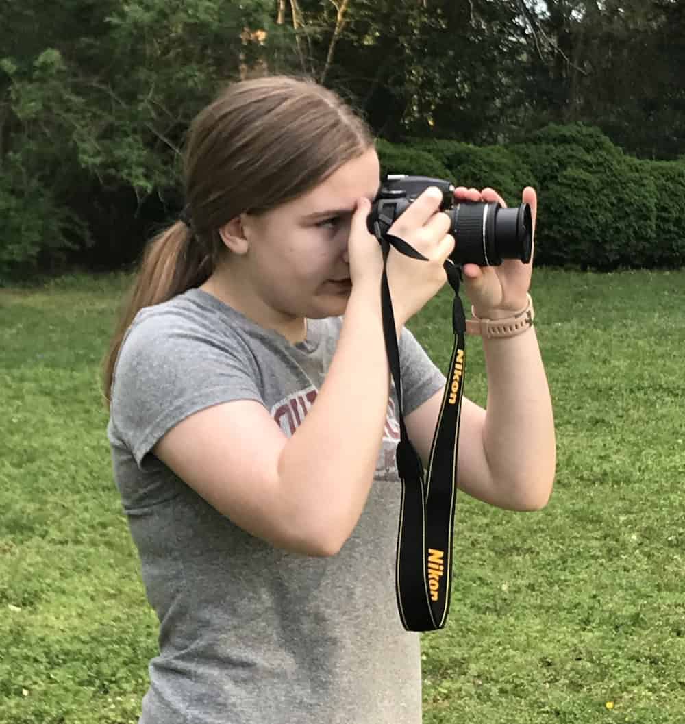 student taking a video
